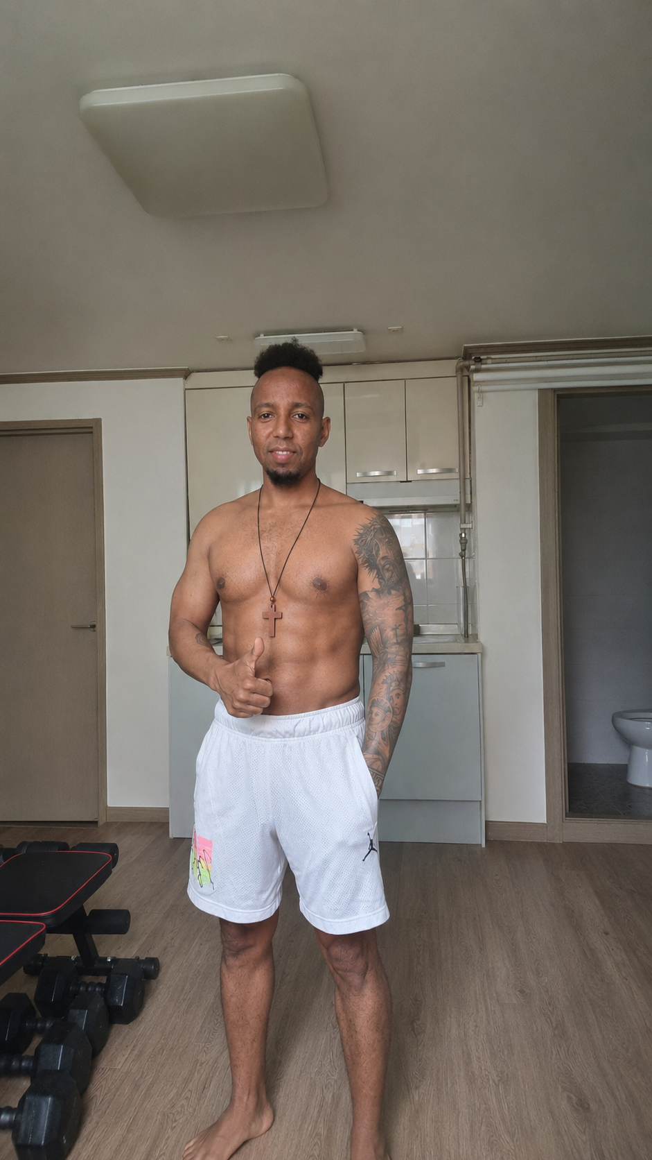 AYE Fit Hub training photo — thumbs up after a home workout session