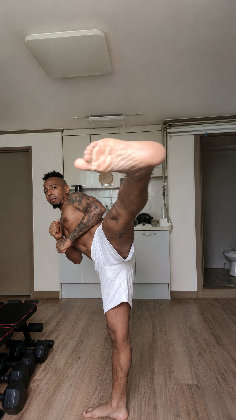 AYE Fit Hub training photo — high kick demonstrating mobility and power